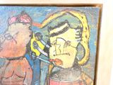 un tableau accroché au mur représentant une femme et un homme