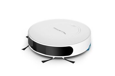 une image d'un aspirateur robotisé sur une surface blanche