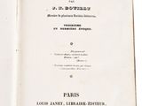 an open book with a black and white image of the title of a book