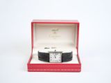 an image of a watch in a red box on a white surface
