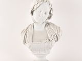 a white busturine of a woman on a pedestal