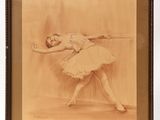 an old picture of a ballerina in a tutu with a sword