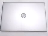 a laptop that is sitting on a white table