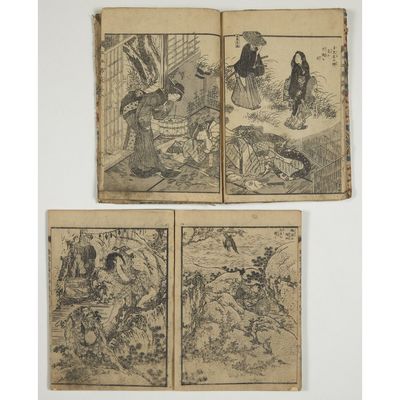 a set of three old japanese woodblocks depicting a man and woman in a garden