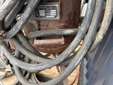 an image of a bunch of wires are stacked on top of a pallet
