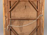 an old wooden frame with a rope hanging from it ' s sides