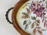 a picture of a tray with a painting of flowers on it