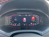 the dashboard of a car with a digital display in the center