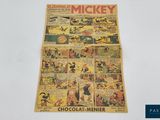 une bande dessinée de Mickey Mouse sur fond blanc, avec une bordure bleue