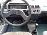 dashboard of a car with a steering wheel and dashboard controls