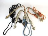 a lot of different types of hoses on a white surface