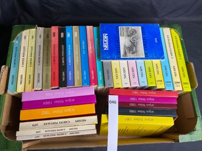a lot of books in a box on the table