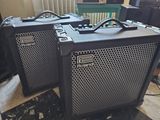 two amps that are sitting next to each other