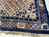 a large oriental rug on the floor in a room