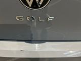 the back end of a volkswagen golf car with the word golf written on it