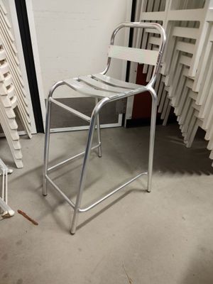 a chair that is sitting in the middle of a room