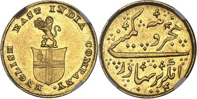 a gold coin with an image of a lion on top of it