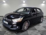 a picture of a black car parked in a garage