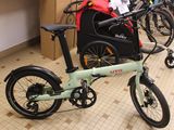 a bike with a bag on the back of it in a store