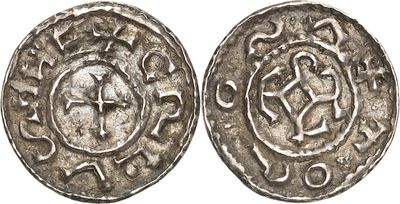 a silver coin with an image of a man on it
