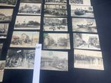 a lot of old black and white photos on the table