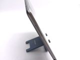 a close up of a cell phone on a stand