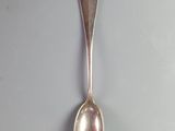 a spoon that is sitting on a table