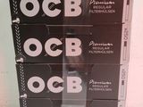 three boxes of ocbb are stacked on top of each other