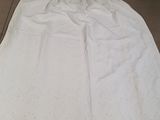 a white towel that is laying on the floor