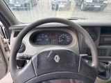 dashboard of a car with a steering wheel and dashboard gauges