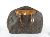 an image of a louis vuitton handbag on a white background