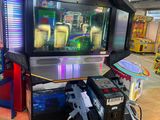 une console de jeux vidéo au milieu d'une pièce