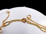 gold plated chain bracelet with pearls and a pearl bead