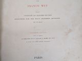 an old book with the title of a poem written in french