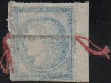 an old stamp with a picture of a woman on it