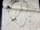 a drawing of a parrot sitting on a piece of paper