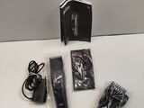 a hair dryer and other items that are on the table