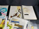 a lot of books and papers on a table