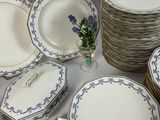 a lot of plates that are sitting on a table