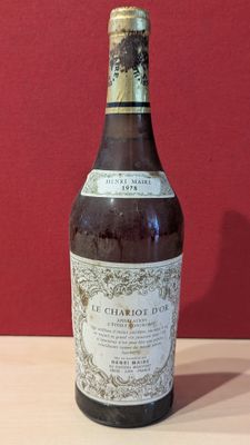 a bottle of wine that is sitting on a table