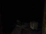 a door that is open in a dark room