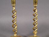 pair of brass candlesticks with twisted spiral design