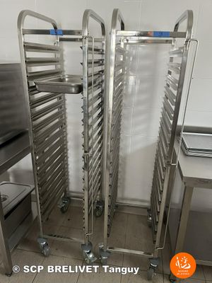 a metal rack that has a bunch of trays on it