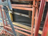 two chairs that are next to each other in the dirt