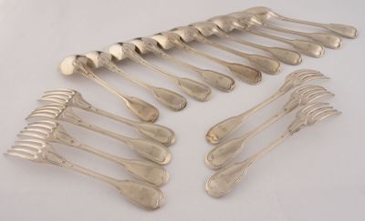 a lot of silver spoons and forks on the table