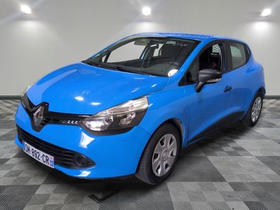 a blue car is parked in a room with a checkered floor