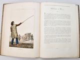 an open book with a picture of a man holding a stick