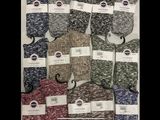 many pairs of socks with tags on them