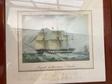 painting of a ship in a frame on a wall