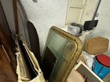 a pile of assorted items on the floor in a room